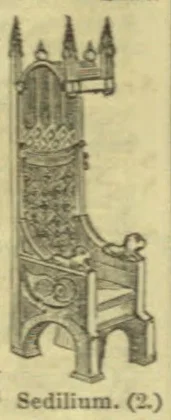 An ornate medieval high-backed chair with a carved canopy and decorative panels.