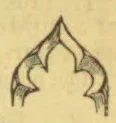 A pointed Gothic-style arch with a smaller cusped opening inside it.