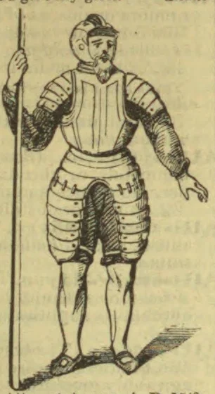 A man wearing a helmet and full plate armor stands holding a long spear.