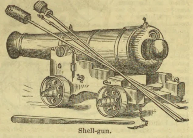 An antique shell gun mounted on a wheeled carriage, with its long barrel and firing tools shown.