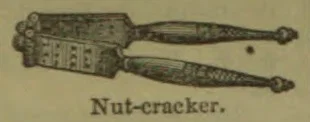 An antique lever-style nutcracker with two long handles and a box-shaped crushing chamber.
