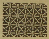 A repeating geometric pattern of interlocking dark and light shapes arranged in horizontal rows.