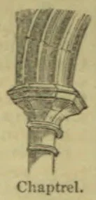 An architectural detail showing a molded stone support where a ribbed arch meets a column.