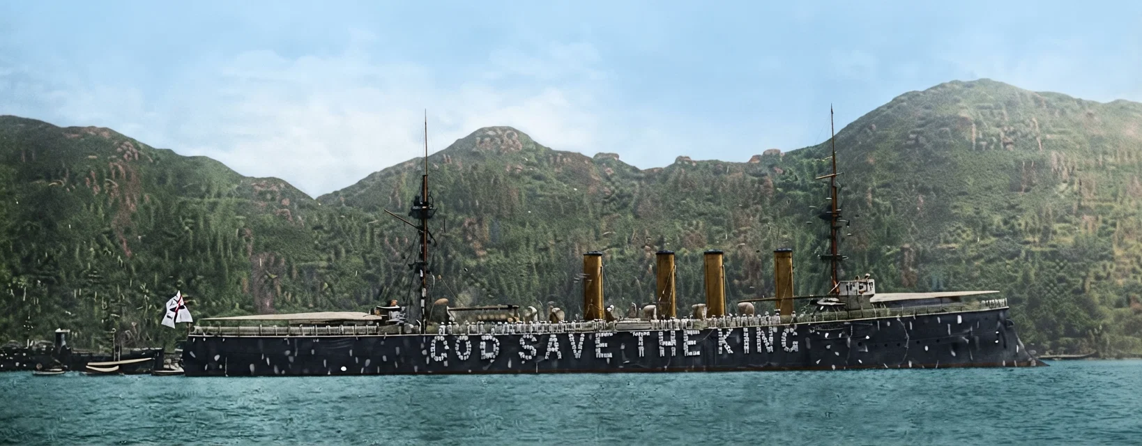 H. M. S. “Terrible” in Christmas dress, in Hongkong, 1903. The letters on the great battle-ship's side are formed of the ship's crew in white.