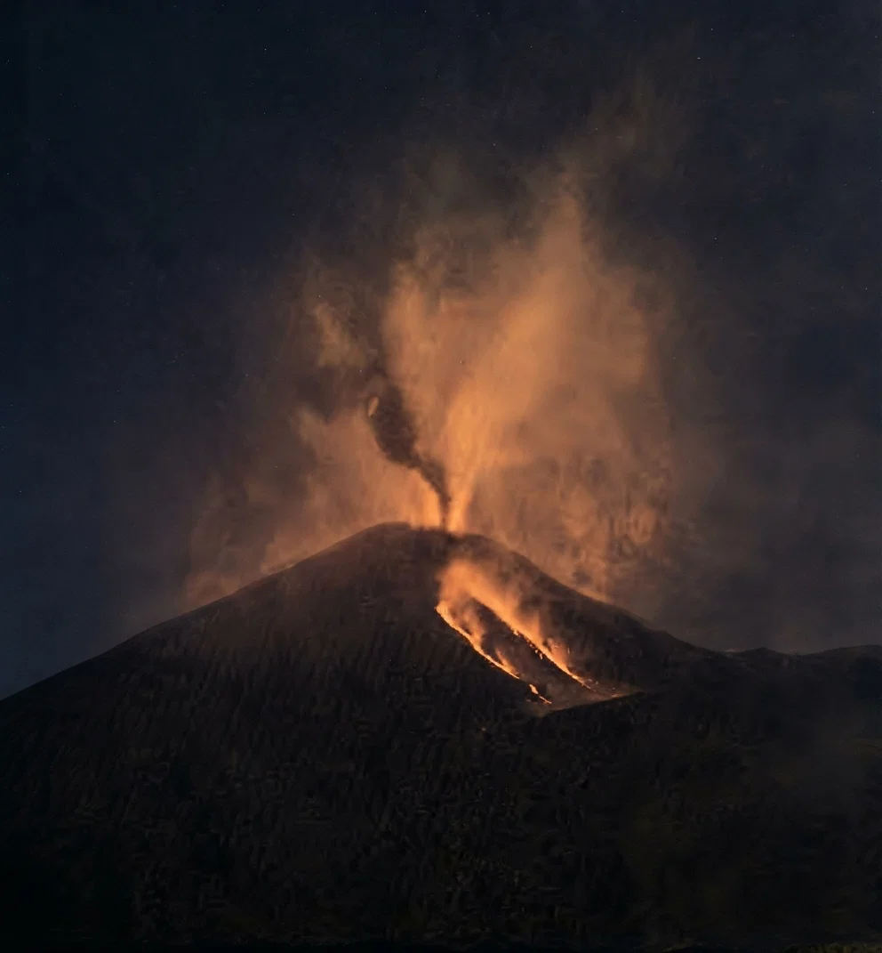 From a Photograph of Vesuvius in Action.—The world-renowned volcano, 10 miles from Naples, Italy, which has covered so many towns and cities with ashes, notable among which are Pompeii and Herculaneum, in A.D. 79. The former was buried 20 feet in loose ashes; the latter was covered with mud. The following years are noted for outbursts: 203, 472, 512, 685, 983, 1066, 1631, 1779, 1794, 1822, 1855, 1865, 1872, 1878, 1880, 1895, 1906. In 1822 it lost 800 feet of its height, the top becoming a great crater 3 miles in circumference and 1,000 feet deep. It is still active and disturbed, especially during the recent earthquake disturbances.