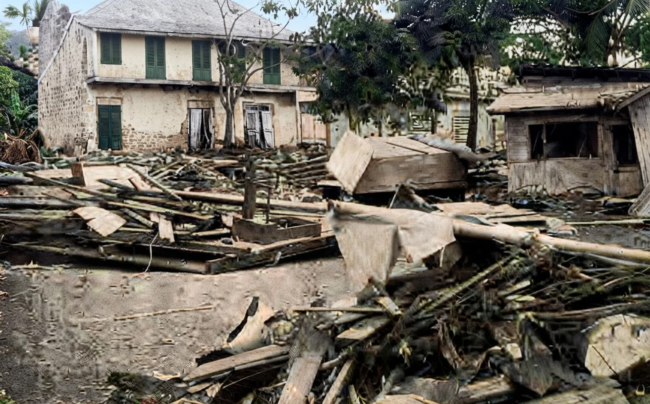 A Scene in Papeete after the Storm. The large building in the background was moved from its foundation.