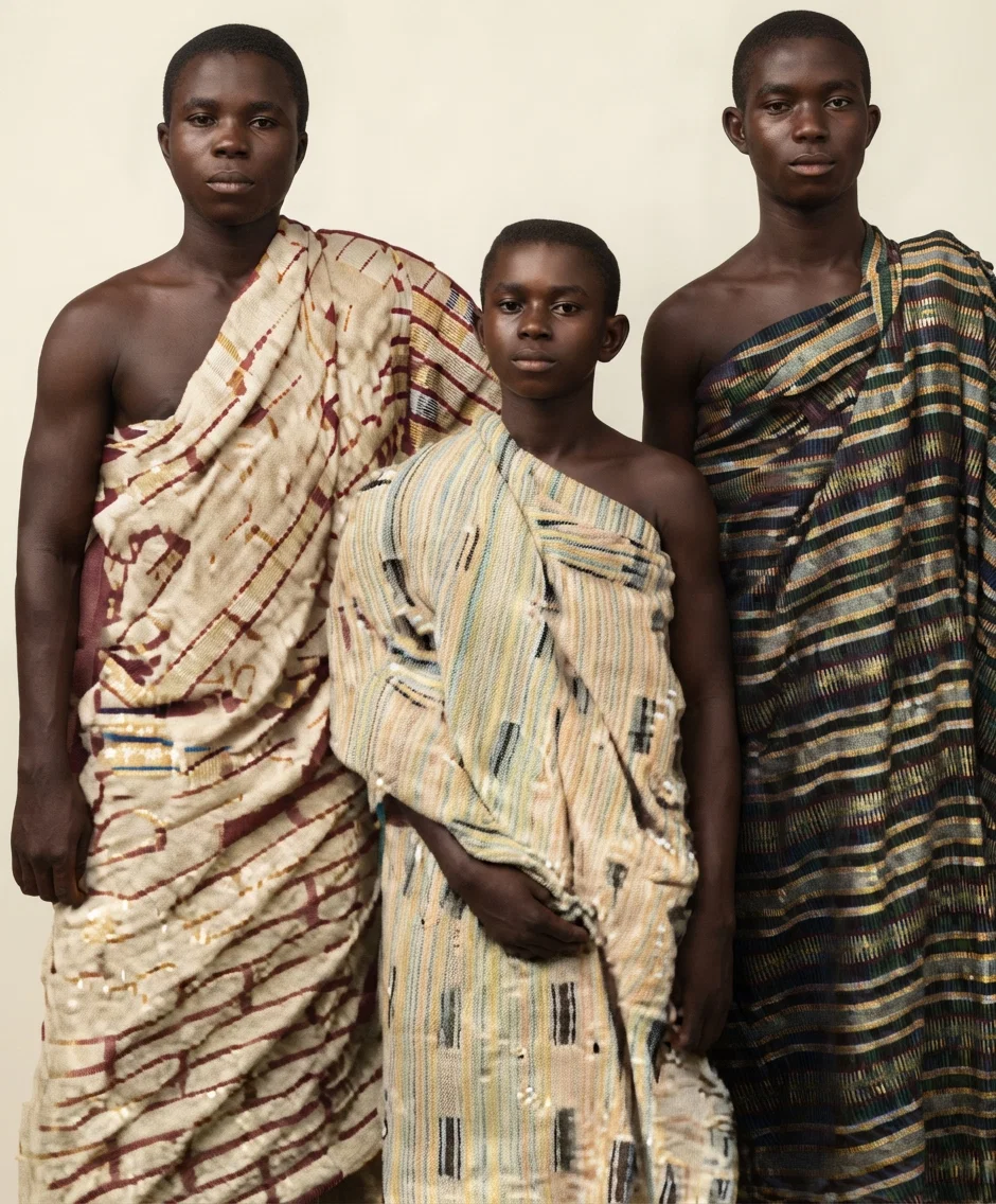 Three Fanti, Gold Coast, boys in native costume in attendance at the Waterloo school, Sierra Leone, West Africa