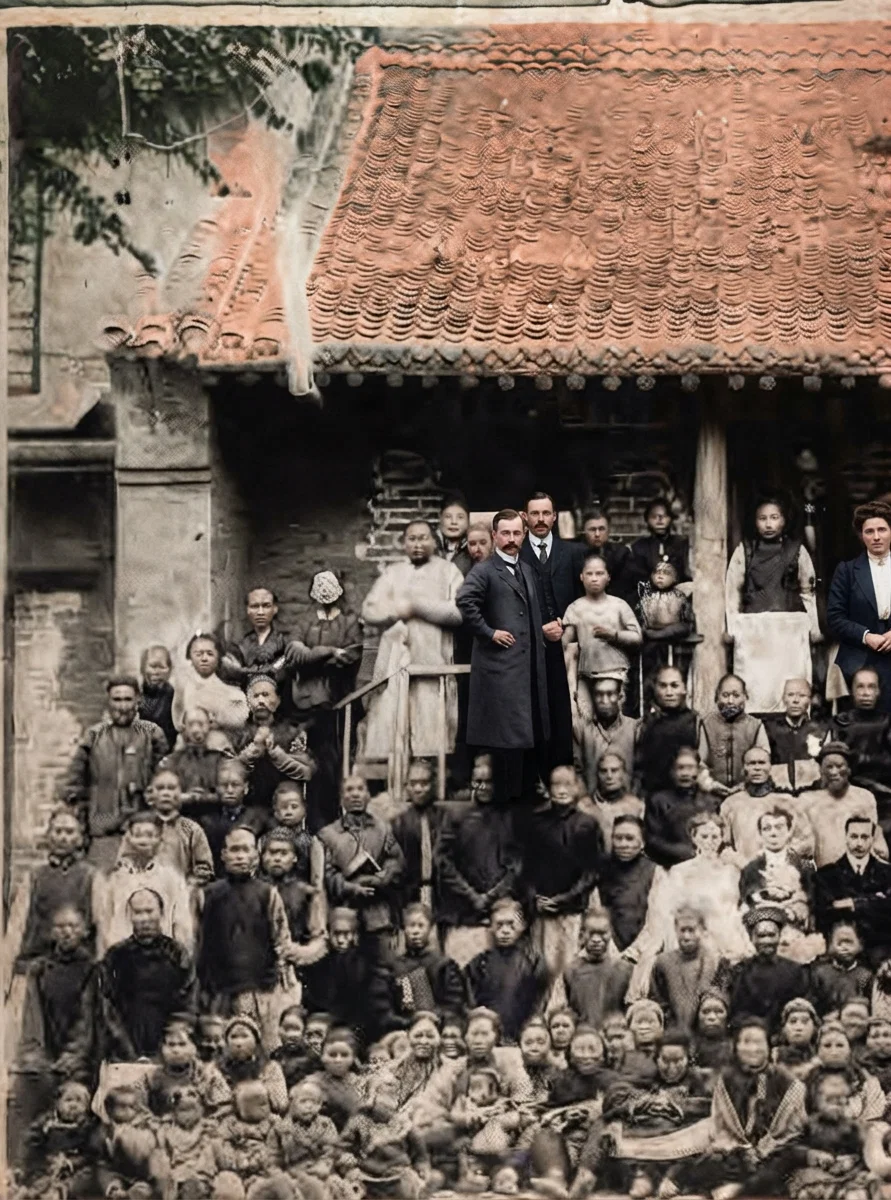A GROUP OF CHINESE CONVERTS AT A MISSION STATION.