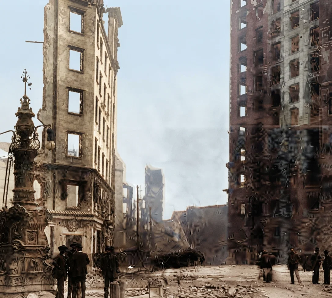 On the left side of the picture is the San Francisco Examiner Building, or what was left of it after the fire. On the right side is the Call Building. The walls stand intact with all woodwork burned by the fire.