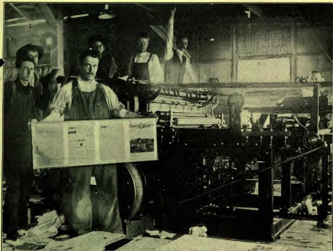 Our New Cottrell Press, on which the SIGNS was printed last week. The foreman of the press room in front.