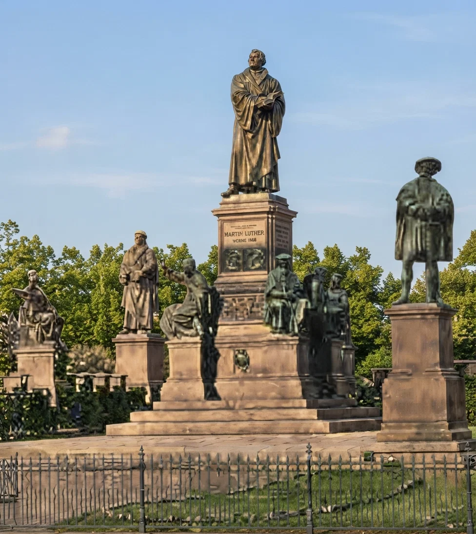 Luther monument at Worms, Germany. The best way to honor Luther and his work is not by memorials of stone, is not the exaltation of the man nor the crystallization of his creed, but the imitation of his faith in the Word of God.
