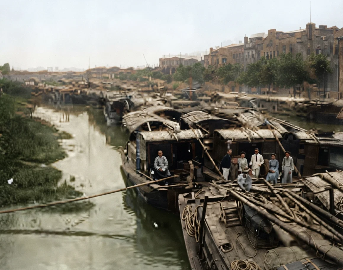 This is a picture of a string of house-boats on Loochow Creek in Shanghai. The launch steams along every day, and picks out those that are ready to go. The center boat shows a party ready to start for Mokanshan — Brother and Sister Westworth and Paul Westworth, Dr. and Mrs. Larsen, and Mrs. H. H. Winslow.